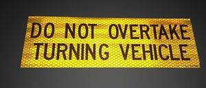 DO NOT OVERTAKE TURNING VECHICLE Reflective Sign (gold)